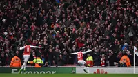 Striker Arsenal, Danny Welbeck, merayakan gol yang dicetaknya ke gawang Leicester City di menit akhir dalam laga Liga Inggris di Stadion Emirates, London, Minggu (14/2/2016). (Action Images via Reuters/Tony O'Brien)