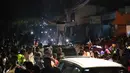 Lolosnya Timnas Haiti langsung disambut gegap gempita seluruh warga di jalan-jalan. Tampak dalam foto, warga Haiti turun ke jalan-jalan di Port-au-Prince saat merayakan lolosnya tim nasional mereka di putaran final Piala Dunia 2026, pada Selasa 18 November 2025 waktu setempat. (Clarens SIFFROY/AFP)