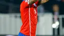 Gelandang Chile, Arturo Vidal melakukan selebrasi usai mencetak gol di pertandingan Copa America 2015 di National Stadium, Santiago, Chile, (16/6/2015). Chile bermain imbang 3-3 dengan Meksiko. (REUTERS/Ivan Alvarado)