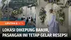 Banjir yang melanda Kabupaten Sumenep, Jawa Timur, membuat puluhan rumah warga kebanjiran. Namun di tengah suasana banjir, sepasang mempelai, warga Desa Maregan, Sumenep, tetap menggelar resepsi pernikahan.