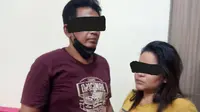 TR dan istrinya diciduk polisi di Lampung. (Dian Kurniawan/Liputan6.com)