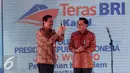 Dirut BRI Asmawi Syam (Kanan) dan Wagub DKI Jakarta Djarot Saiful Hidayat saat peluncuran Teras BRI Kapal di Muara Angke, Jakarta, Selasa (4/8/2015). Teras BRI Kapal untuk menjangkau masyarakat pesisir Kepulauan. (Liputan6.com/Faizal Fanani)