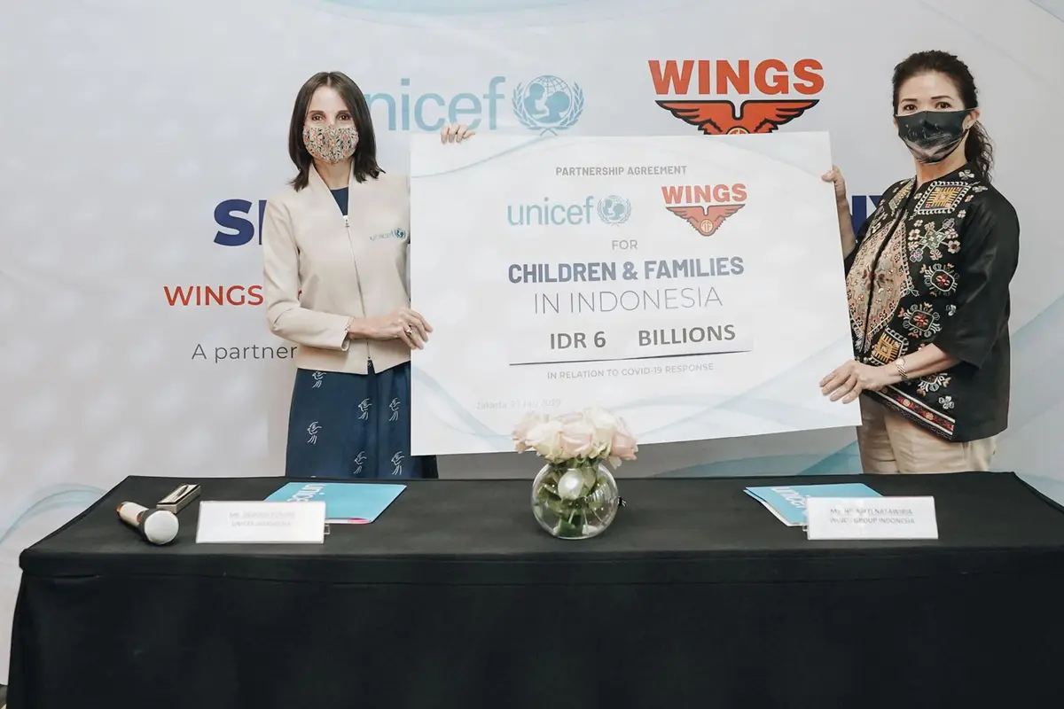 tanda tangan wings dan unicef