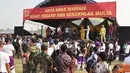 Citizen6, Surabaya: Brigadir Jenderal TNI A Faridz Washington secara resmi membuka acara Hari Anak tahun 2011 di lapangan Apel, Trian Ewa Pangalela Kolatmar, Gunung Sari, Surabaya, Selasa (5/7). (Pengirim: Diyat Akmal)