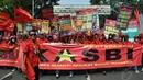 Massa dari Kongres Aliansi Serikat Buruh Indoensia (KASBI) dan Buruh Nasional ini menuntut penghapusan sistem kontrak kerja dan meningkatkan hak-hak perempuan, Jakarta, (15/9/14). (Liputan6.com/Miftahul Hayat)