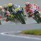 Rivalitas Valentino Rossi dan Marc Marquez merupakan cerita selalu terkenang oleh para pencinta balap. Mereka berdua merupakan Juara Dunia MotoGP yang saat ini sudah mulai pudar masa keemasannya. Berikut ini 5 persaingan panas Rossi dan Marquez di ajang MotoGP. (AFP/Robert Michael)