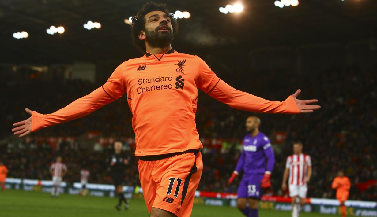 1. Mohamed Salah (Liverpool) - 12 Gol. (AFP/Geoff Caddick)