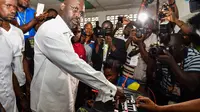 Legenda AC Milan George Weah jadi presiden terpilih Liberia. (AFP / ISSOUF SANOGO)