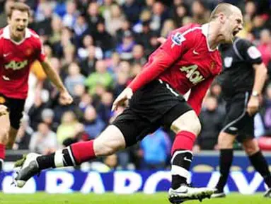 Selebrasi gol striker Manchester United Wayne Rooney ke gawang Blackburn Rovers dalam lanjutan Liga Premier, 14 Mei 2011. AFP PHOTO/GLYN KIRK