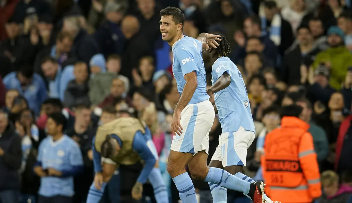 Selebrasi gelandang Manchester City, Rodri setelah mencetak gol ketiga timnya ke gawang Red Star Belgrade pada laga matchday pertama Grup G Liga Champions 2023/2024 di Etihad Stadium, Manchester, Rabu (20/9/2023) dini hari WIB. (AP Photo/Dave Thompson)