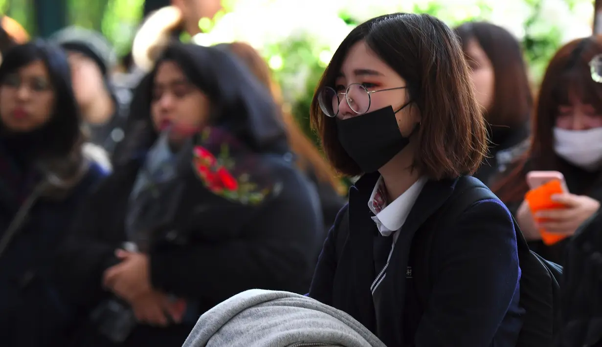 Pihak SM Entertainment juga membuat tempat khusus untuk para penggemar yang ingin memberikan penghormatan terakhir untuk Jonghyun. (JUNG Yeon-Je/AFP)