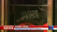 Bendera Hitam Bertulisan Arab Terpampang di Kafe Teror Sydney