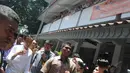 Saat tiba di SMP Negeri 277 Jakarta Utara, Jokowi disambut teriakan histeris para siswa, (23/9/14). (Liputan6.com/Herman Zakharia)