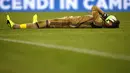 Ekspresi Gianluigi Donnarumma usai gawangnya kebobolan saat mewalan Juventus dalam pertandingan Liga Italia Serie A di stadion Juventus di Turin pada 10 Maret 2017. (AFP Photo/Marco Bertorello)