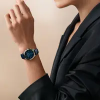 Baume Mercier Clifton Baumatic 34 mm. [Dok/Baume Mercier].