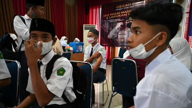 FOTO: Pelajar SMP di Blang Bintang Jalani Vaksinasi COVID-19