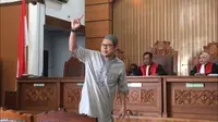Pimpinan JAD Zainal Anshari usai mendengar putusan hakim. (Merdeka.com/Nur Habibie)