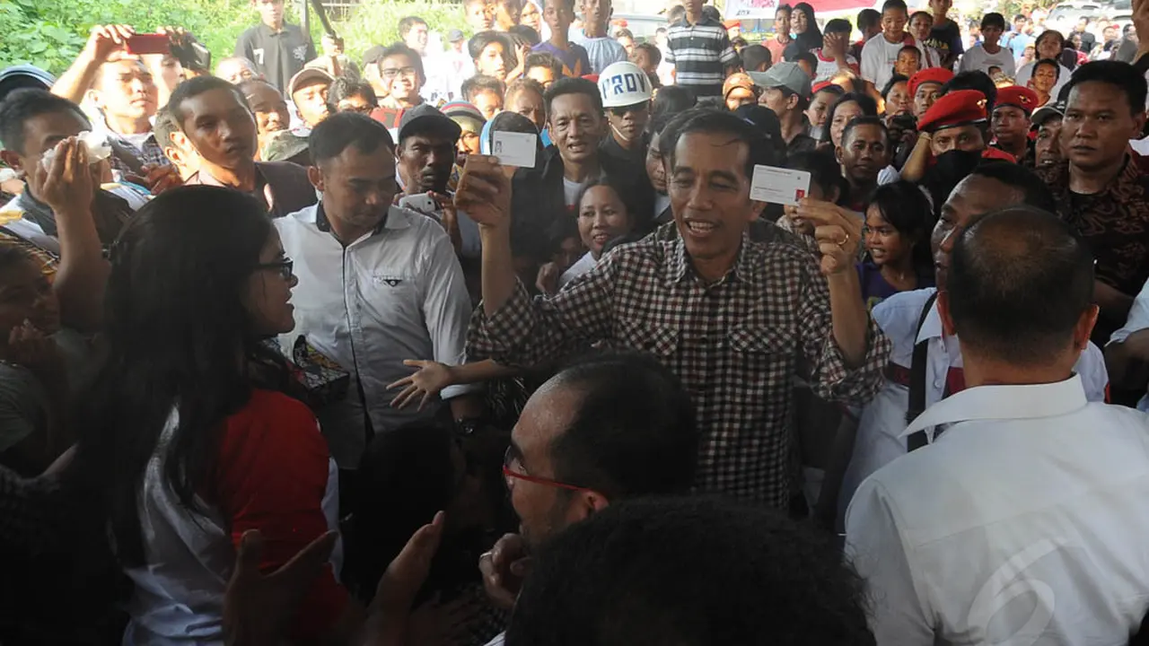 Jokowi Didampingi Istri Sambangi Kampung Nelayan