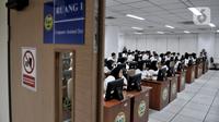 CPNS saat mengikuti SKD di Kantor BKN Pusat, Jakarta, Senin (27/1/2020). Tes SKD CPNS Tahun Anggaran 2019 diselenggarakan mulai 27 Januari hingga 28 Februari 2020 dengan jumlah peserta memenuhi syarat (MS) untuk mengikuti SKD sebanyak 3.364.868 orang. (merdeka.com/Iqbal S. Nugroho)
