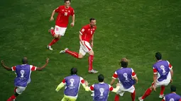 Penyerang Timnas Swiss, Haris Seferovic (9) merayakan golnya ke gawang Ekuador di laga penyisihan Piala Dunia 2014 Grup E di Estádio Nacional de Brasilia, (15/6/2014). (REUTERS/David Gray)