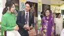 Berkunjung ke Taman Mini Indonesia Indah, ibu negara Kim Hee tampil dengan atasan hijau lengan panjang, dipadukan rok putih. Dengan rambut yang diikat. [@sekretariat.kabinet]