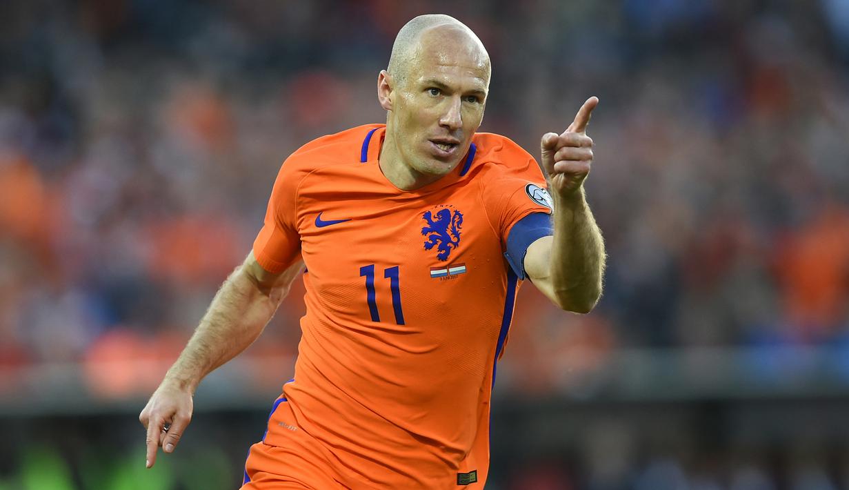 Arjen Robben tercatat telah mengemas total 37 gol dari 97 laga bersama Timnas Belanda. Dipanggil sejak 2003 hingga 2017, Robben menjadi kunci sukses Timnas Belanda melaju ke partai final Piala Dunia 2010 dan juara ketiga Piala Dunia 2014. (AFP/John Thys)