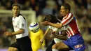 Simeone merupakan gelandang box-to-box yang gesit, teknikal, serta agresif itu mampu menghentikan dan memulai serangan. Simeone kembali ke Atlético Madrid pada tahun 2003 untuk membantu tim kembali ke kasta tertinggi setelah dua musim berada di kasta kedua La Liga. (Foto: AFP/Javier Soriano)