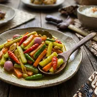Resep Acar Timun Wortel Bumbu Kuning Tanpa Santan Pendamping Masakan Daging Kurban (Sumber: gemini.com)