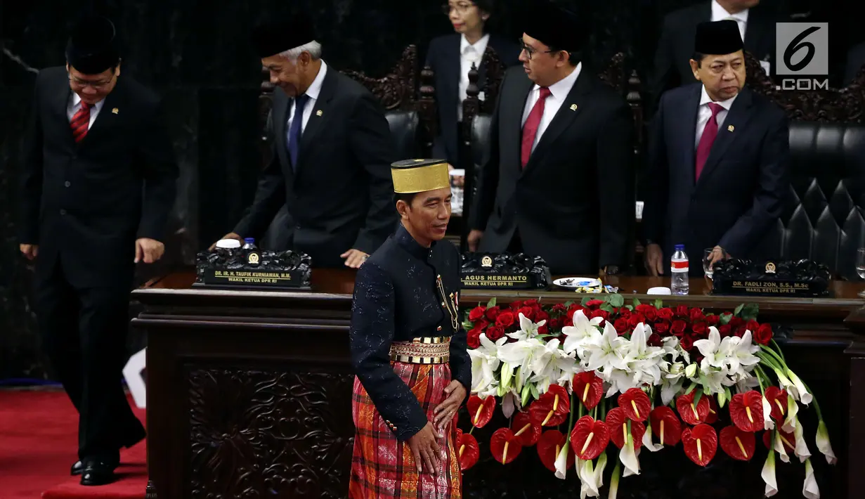 Presiden Jokowi Usai menyampaikan Pidato pada Sidang Tahunan  DPR/DPD di kompleks Parlemen Senayan, Jakarta, Rabu (16/8) Sidang mendengarkan Pidato kenegaraan  Jokowi menyambut HUT ke-72 Kemerdekaan RI. (Liputan6.com/ Johan Tallo)