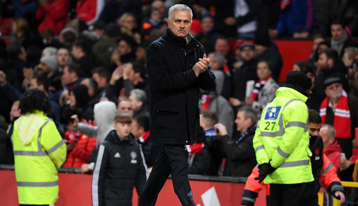 Pekerjaan sebagai pelatih adalah impian pelatih berkebangsaan Portugal tersebut. Dengan begitu jangan menguji lagi kesetiaan Mourinho bersama Manchester United. (AFP/Paul Ellis)