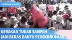Ratusan warga yang didominasi emak-emak sengaja datang ke Pantai Jerman, Bali, untuk menukarkan sampah plastik dengan beras. Pemerintah Pusat mendukung gerakan ini, apalagi Bali akan menjadi tuan rumah KTT G-20, November mendatang.