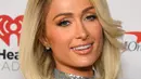 <p>Paris Hilton menghadiri iHeartRadio 102.7 KIIS FM's Jingle Ball 2022 yang dipersembahkan oleh Capital One di The Kia Forum, Inglewood, California, Amerika Serikat, 2 Desember 2022. Sang bintang memilih gaya rambut bob pirang dan riasan glamor dengan bibir mengkilap. (Jon Kopaloff/Getty Images/AFP)</p>