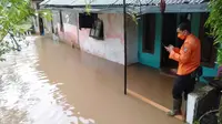 Kota Bogor dilanda banjir, longsor, dan pohon tumbang pada Selasa sore, 19 Oktober 2021. (Liputan6.com/Achmad Sudarno)