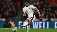 Gelandang Timnas Inggris, Jude Bellingham, tampil selama 90 menit penuh saat timnya menang 2-0 atas Albania pada laga perdana Grup K kualifikasi Piala Dunia 2026 di Stadion Wembley, London, Sabtu (22/3/2025) dini hari WIB. (AFP/Glyn KIRK)