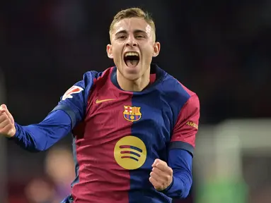 Pemain Barcelona, Fermin Lopez melakukan selebrasi setelah mencetak gol ke gawang Valencia pada laga lanjutan Liga Spanyol 2024/2025 di Estadi Olimpic Lluis Companys, Barcelona, Spanyol, Senin (27/01/2025) dini hari WIB. (AFP/Manaure Quintero)