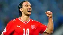 Swiss midfielder Hakan Yakin jubilates after scoring a goal during the Euro 2008 Championships Group A football match Switzerland vs. Portugal on June 15, 2008 at Jakob-Park stadium in Basel. AFP PHOTO / DANIEL MIHAILESCU