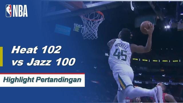 Dwyane Wade memukul dua lemparan bebas kopling untuk menyegel kemenangan bagi Miami, 102 - 100.