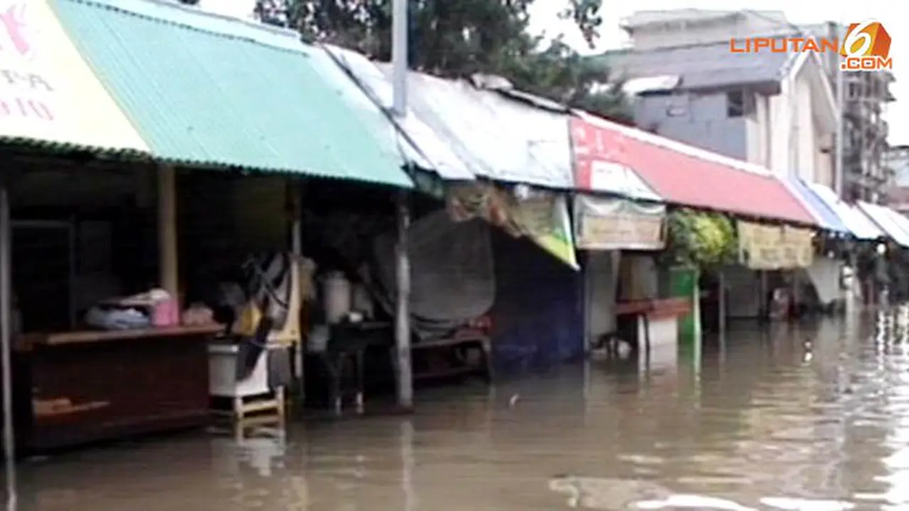 banjir-pasar-baru-140123b.jpg