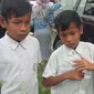 Biaya SPP yang ditunggak bocah kembar itu kepada sekolah sebesar Rp 2 juta. (Liputan6.com/M Syukur)