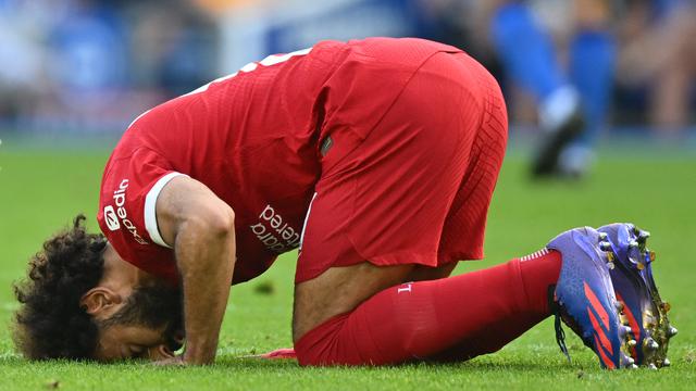 Mohamed Salah mencetak gol untuk Liverpool ke gawang Brighton & Hove Albion.