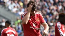 Pemain Manchester United Harry Maguire tertunduk lesu (AFP)
