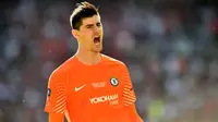 Real Madrid melalui situs resminya pada Rabu (8/8/2018), mengumumkan telah mencapai kesepakatan dengan Chelsea terkait transfer Thibaut Courtois. (AFP/Glyn Kirk)