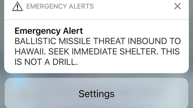 Notifikasi ancaman misil di Hawaii (13/1/2018) yang ternyata sebuah 'false alarm' alias imbauan palsu (supplied via The New York Times)