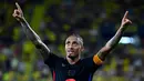 Gol Raphinha pada menit ke-74 dan 83 menyudahi perlawanan Villarreal pada pertandingan ke-enam Liga Spanyol musim 2024/2025. (JOSE JORDAN/AFP)