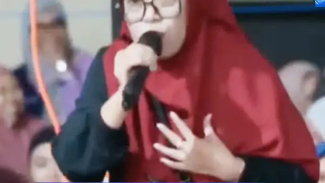 Mila Jemaah Gus Iqdam yang kini menjadi tulang punggung keluarga dan betah menjanda (Tangkap Layar YouTube Arek Jalanan / Khazim Mahrur)