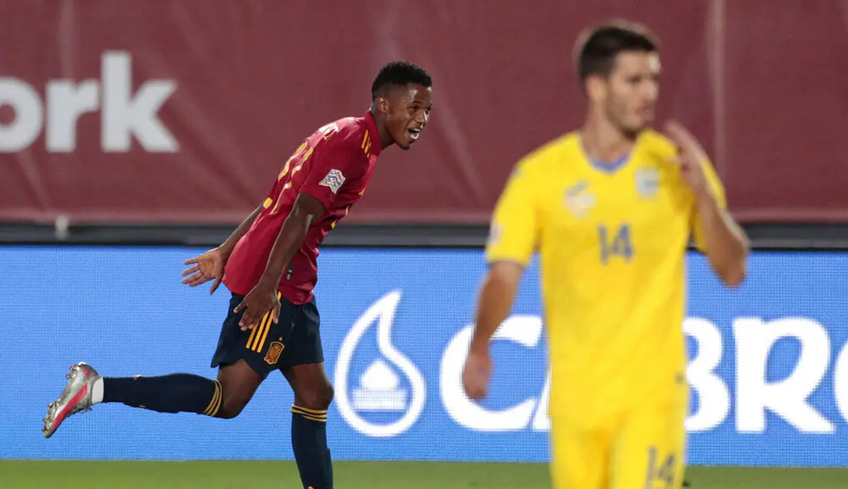 Pemain Spanyol, Ansu Fati, melakukan selebrasi usai mencetak gol ke gawang Ukraina pada laga UEFA Nations League Estadio Alfredo Di Stefano, Senin (7/9/2020). Spanyol menang 4-0 atas Ukraina. (AP Photo/Bernat Armangue)