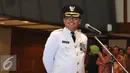 Tri Kurniadi bersiap dilantik menjadi Walikota Jakarta Selatan oleh Gubernur DKI Jakarta Basuki T Purnama di balai kota, Jakarta, Kamis (13/8/2015). Tri resmi menggantikan Syamsuddin Noor yang dipecat. (Liputan6.com/Herman Zakharia)