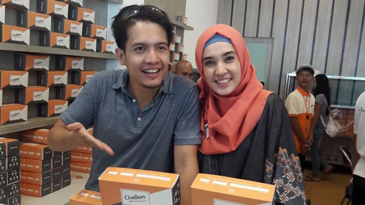 Dhini Aminarti
