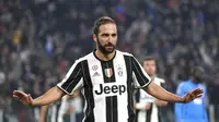  Penyerang Juventus, Gonzalo Higuain memperlihatkan ekspresinya usai mencetak gol ke gawang Napoli, pada laga lanjutan Serie A 2016-2017, di Juventus Stadium, Minggu (30/10/2016) dini hari WIB. Higuan menjadi penentu kemenangan Juventus atas Napoli dengan