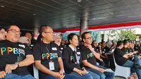 Menteri BUMN Rini Soemarno memimpin upacara inaugurasi pegawai BUMN yang lolos Program Perekrutan Bersama (PPB) yang dibuka pada Maret lalu. (Liputan6.com/Tommy Kurnia)